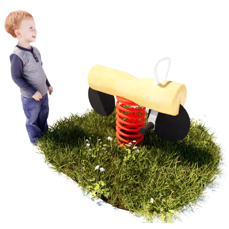 Federwippe Motorrad auf grüner Wiese